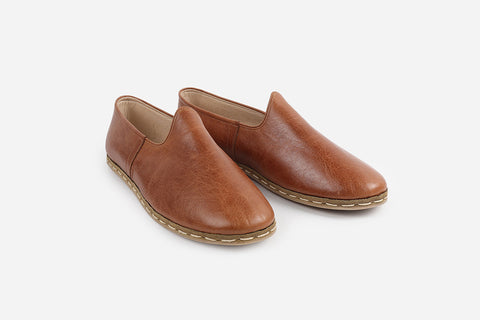 Elegant Chestnut loafers for men, handmade from premium Italian leather with meticulous Turkish craftsmanship.