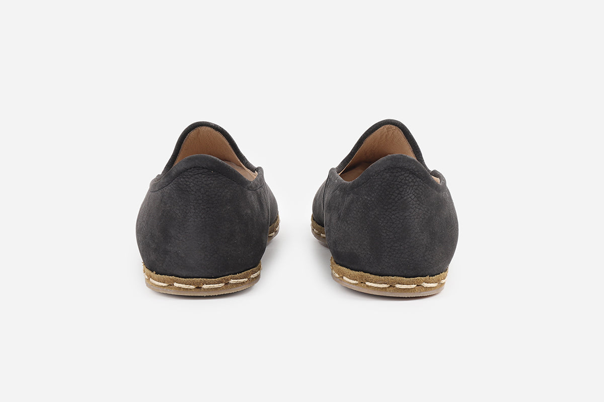 Sophisticated women's loafers in Eclipse Noir nubuck, showcasing a handmade design and a rich, dark color.