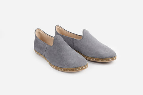 Elegant handmade suede loafers in Mist Grey for women, featuring a subtle grey tone and meticulous craftsmanship.