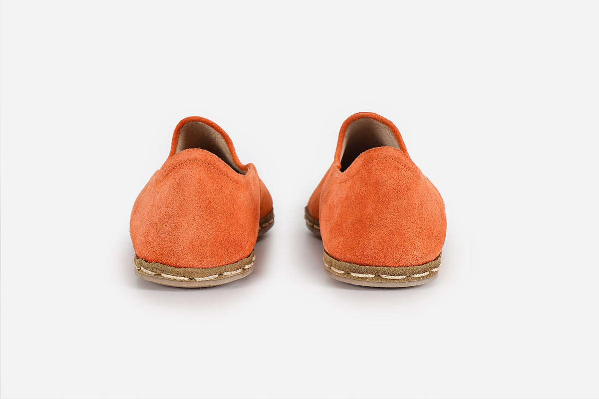 handmade Saffron suede loafers for men, offering a luxurious golden color and detailed craftsmanship from Turkey.